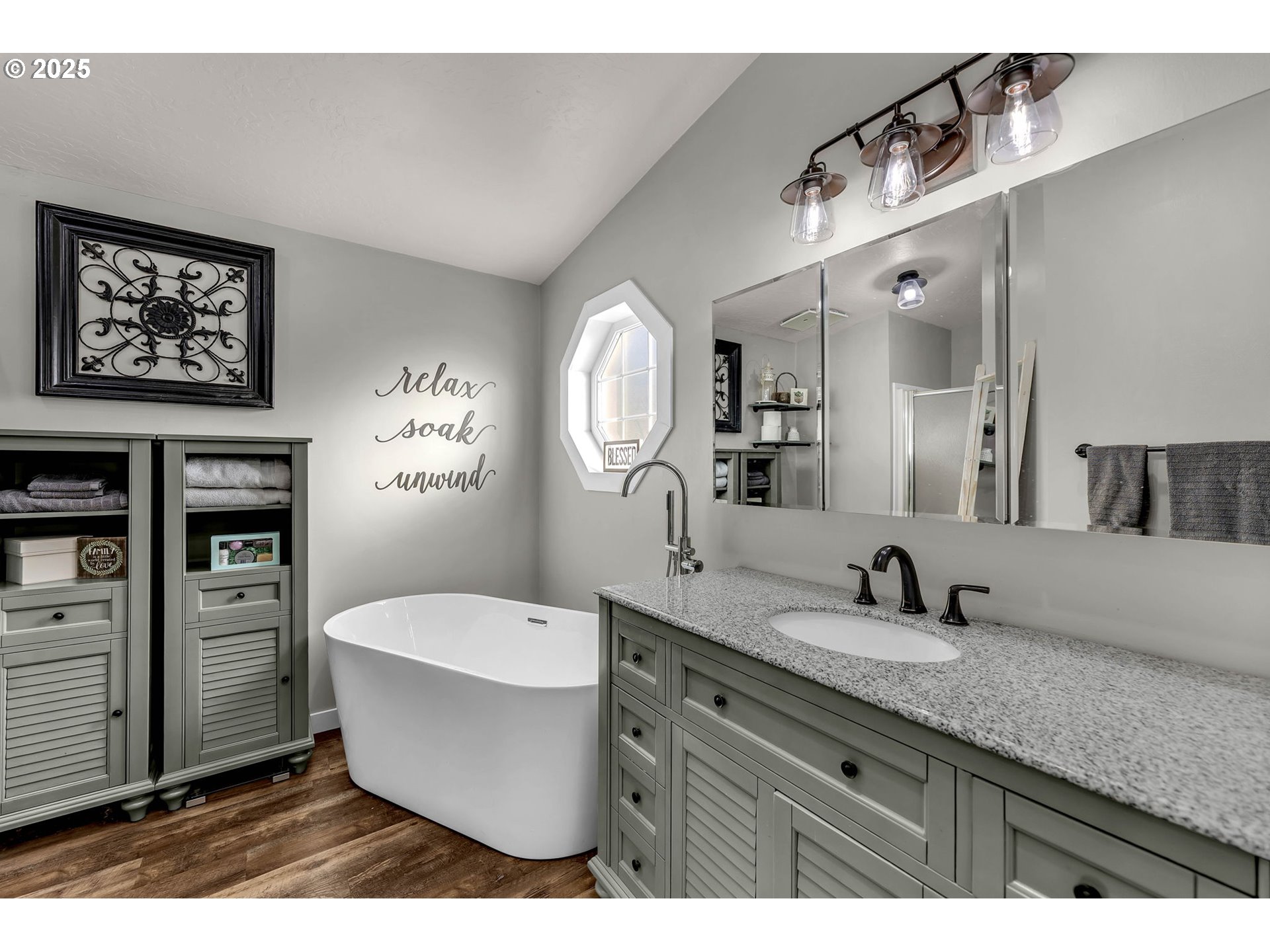 111 Mathany Road Carson, WA 98610 - Photo 27 of 39 a spacious bathroom with a tub sink and mirror