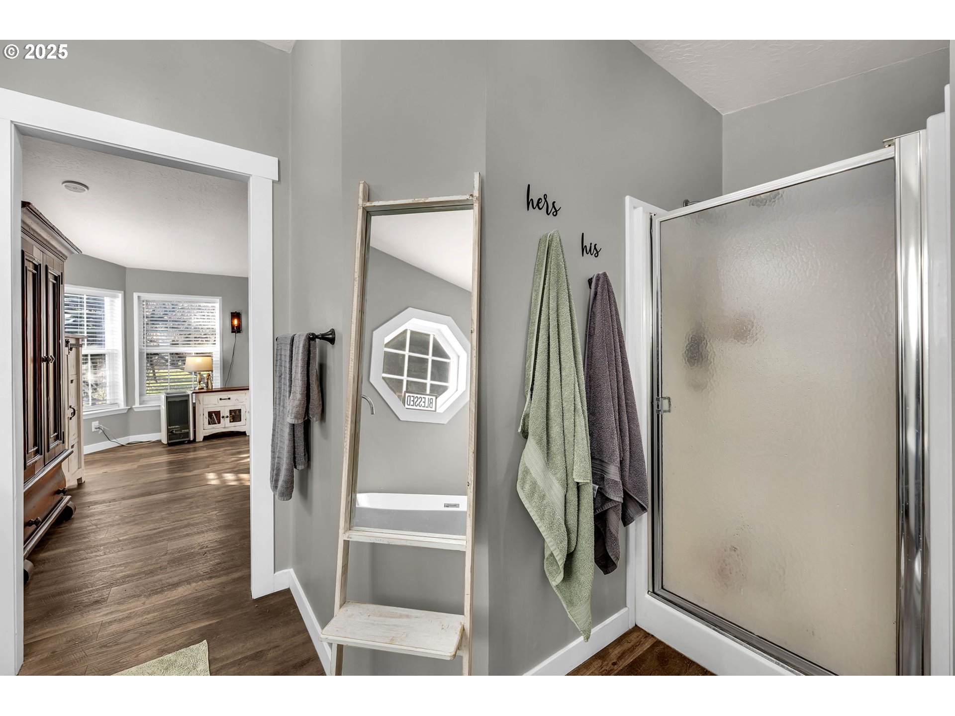 111 Mathany Road Carson, WA 98610 - Photo 28 of 39 a view of a hallway and a livingroom with wooden floor
