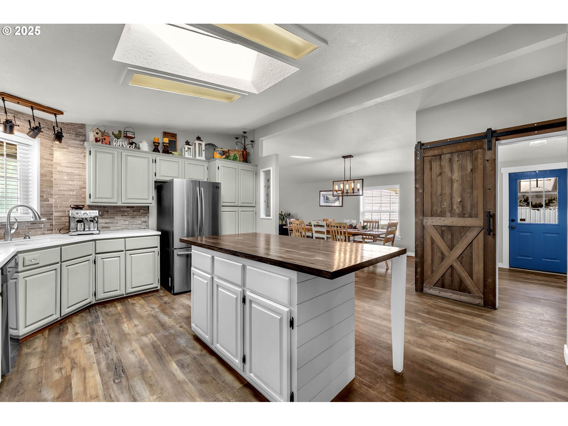 111 Mathany Road Carson, WA 98610 - Photo 8 of 39 a kitchen with stainless steel appliances kitchen island granite countertop a refrigerator and a stove top oven