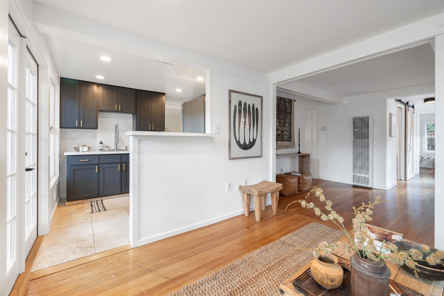 27 Laurel Avenue San Anselmo, CA 94960 - Photo 11 of 52 a living room with furniture and a wooden floor