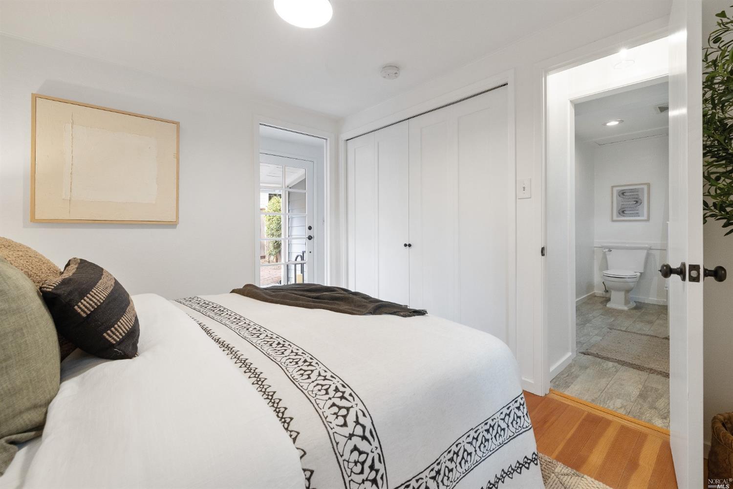 27 Laurel Avenue San Anselmo, CA 94960 - Photo 16 of 52 a bedroom with a bed and a couch