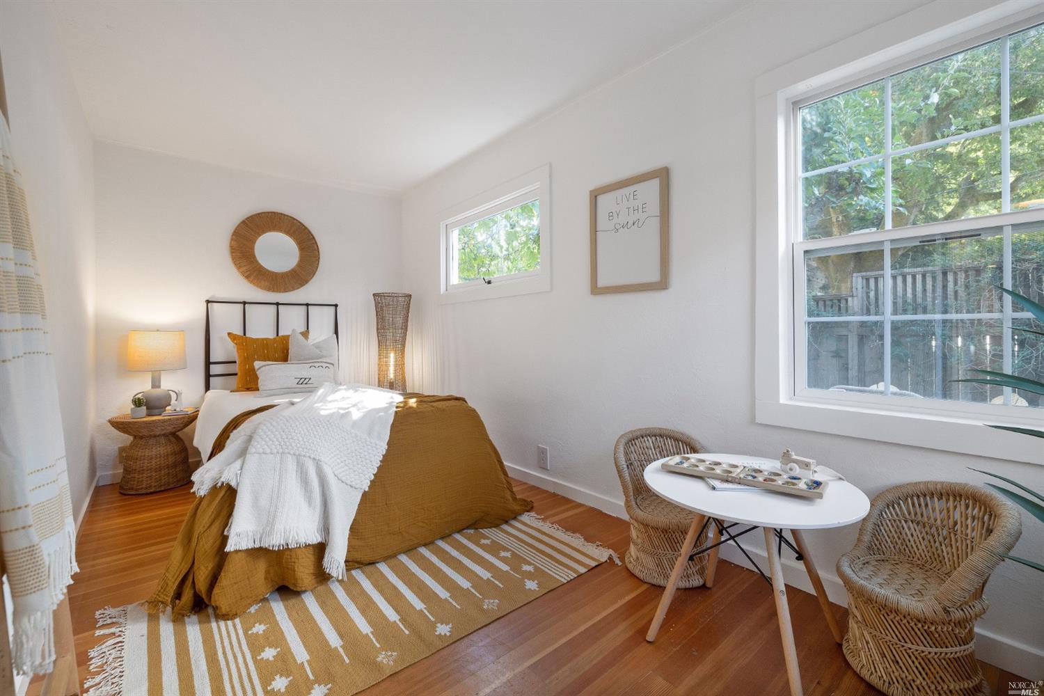 27 Laurel Avenue San Anselmo, CA 94960 - Photo 19 of 52 a bedroom with a bed and a window