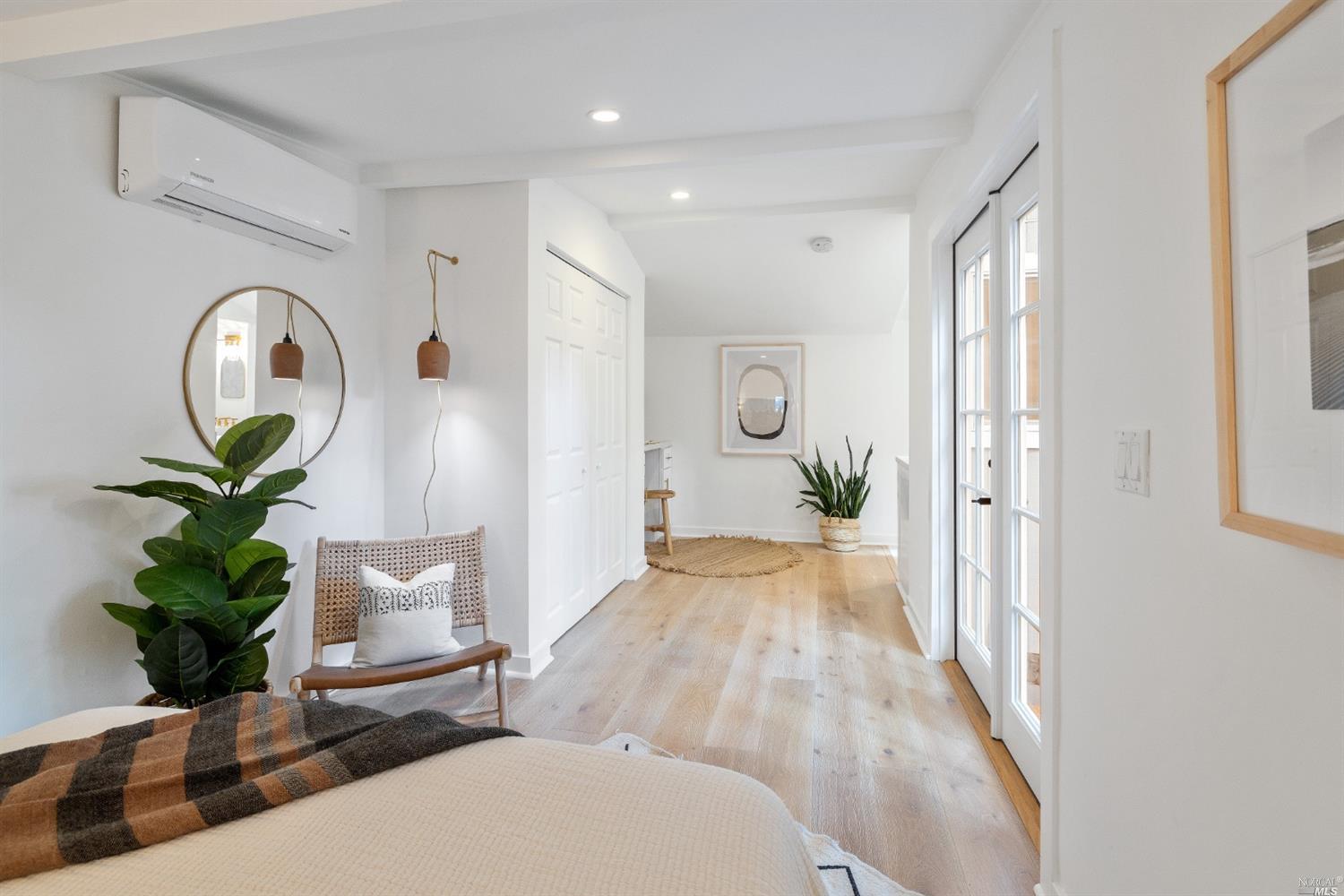 27 Laurel Avenue San Anselmo, CA 94960 - Photo 24 of 52 a view of a livingroom with furniture and a potted plant