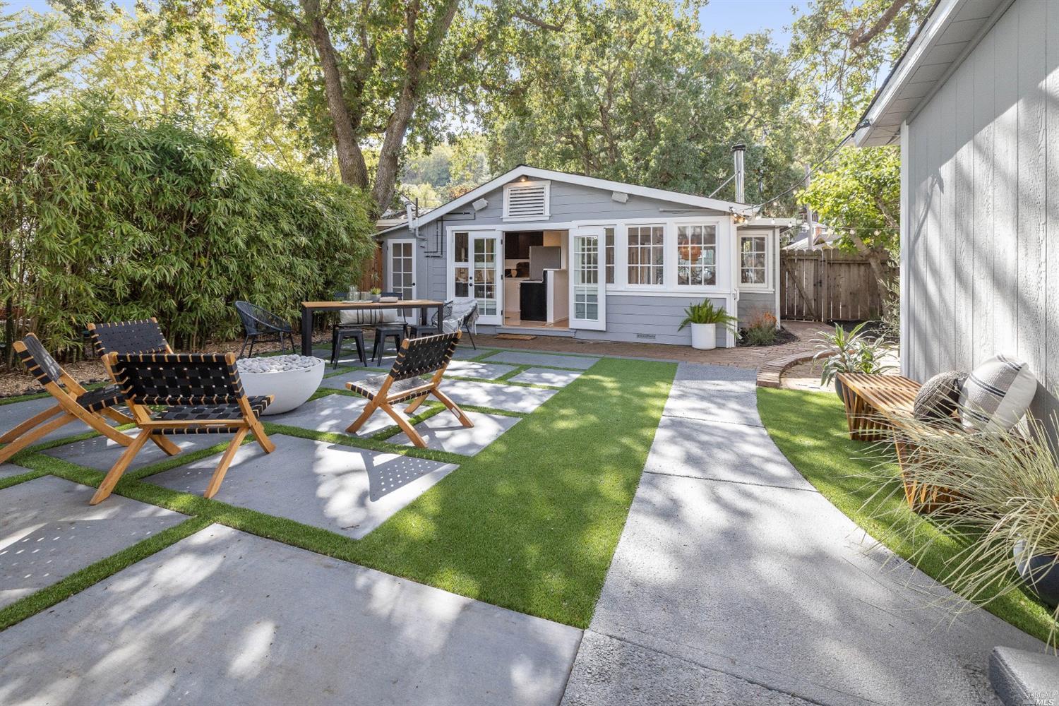 27 Laurel Avenue San Anselmo, CA 94960 - Photo 32 of 52 a view of a house with backyard and sitting area