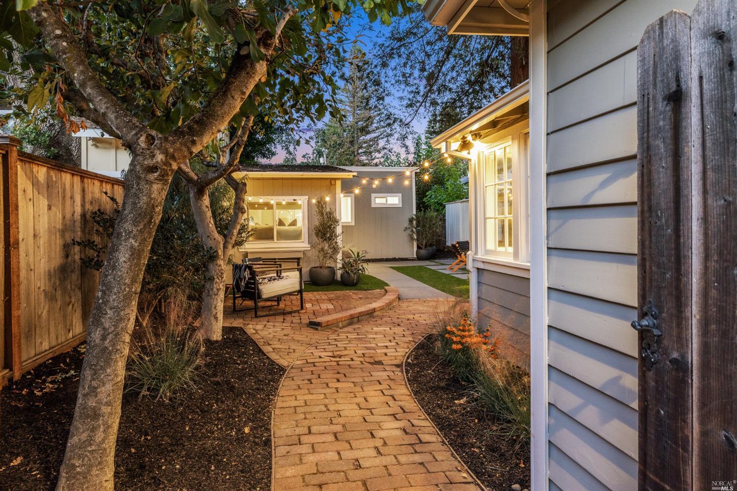 27 Laurel Avenue San Anselmo, CA 94960 - Photo 45 of 52 a view of a porch with wooden floor and a yard