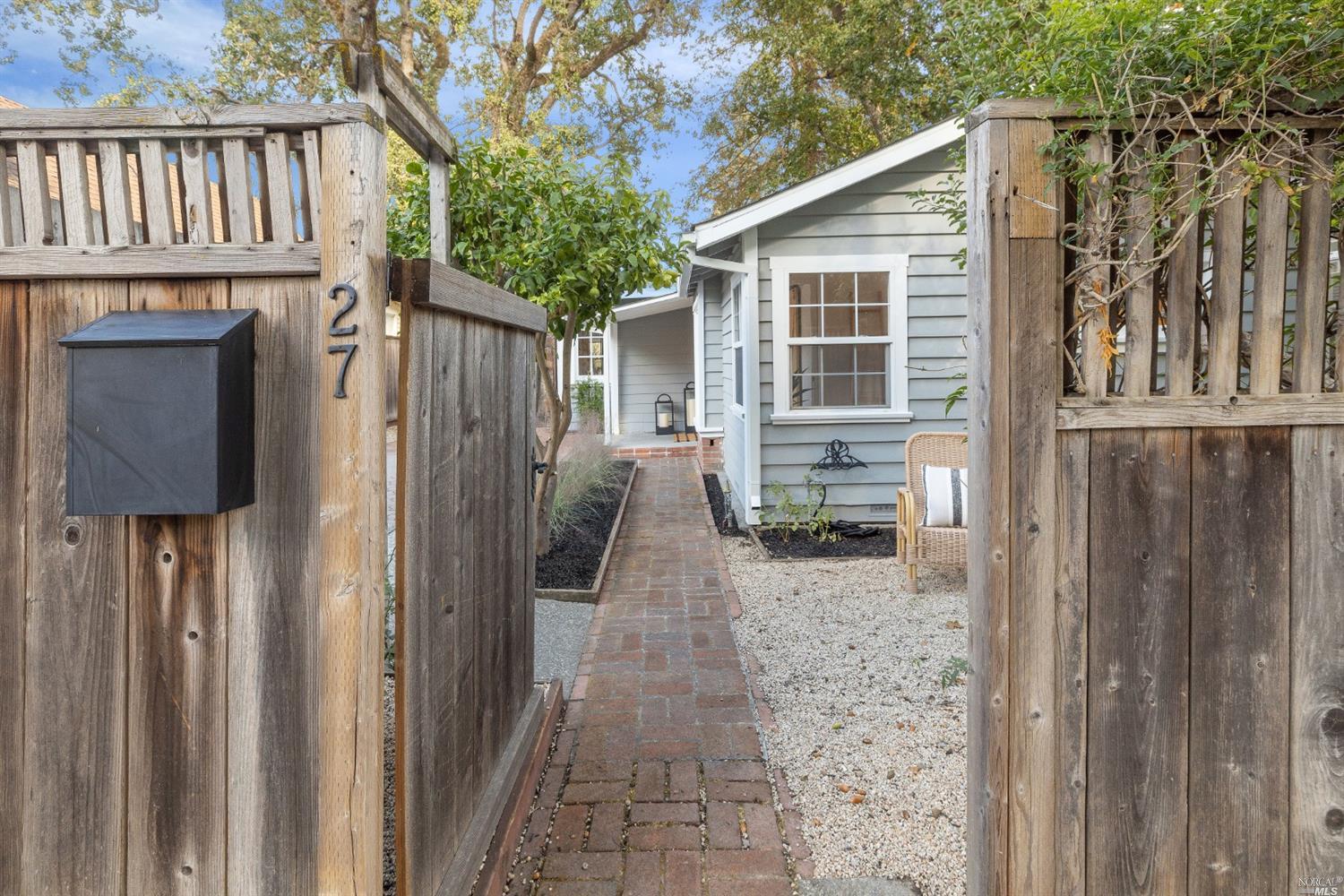27 Laurel Avenue San Anselmo, CA 94960 - Photo 49 of 52 a view of a house with backyard and wooden fence
