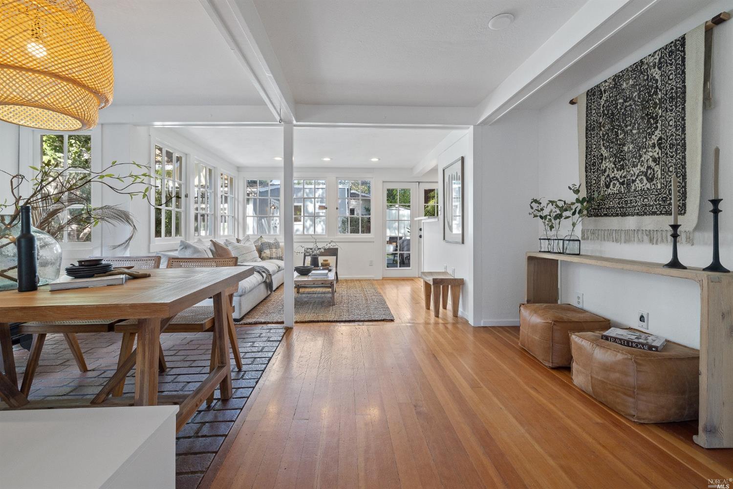 27 Laurel Avenue San Anselmo, CA 94960 - Photo 7 of 52 a living room with furniture a wooden floor and next to a window