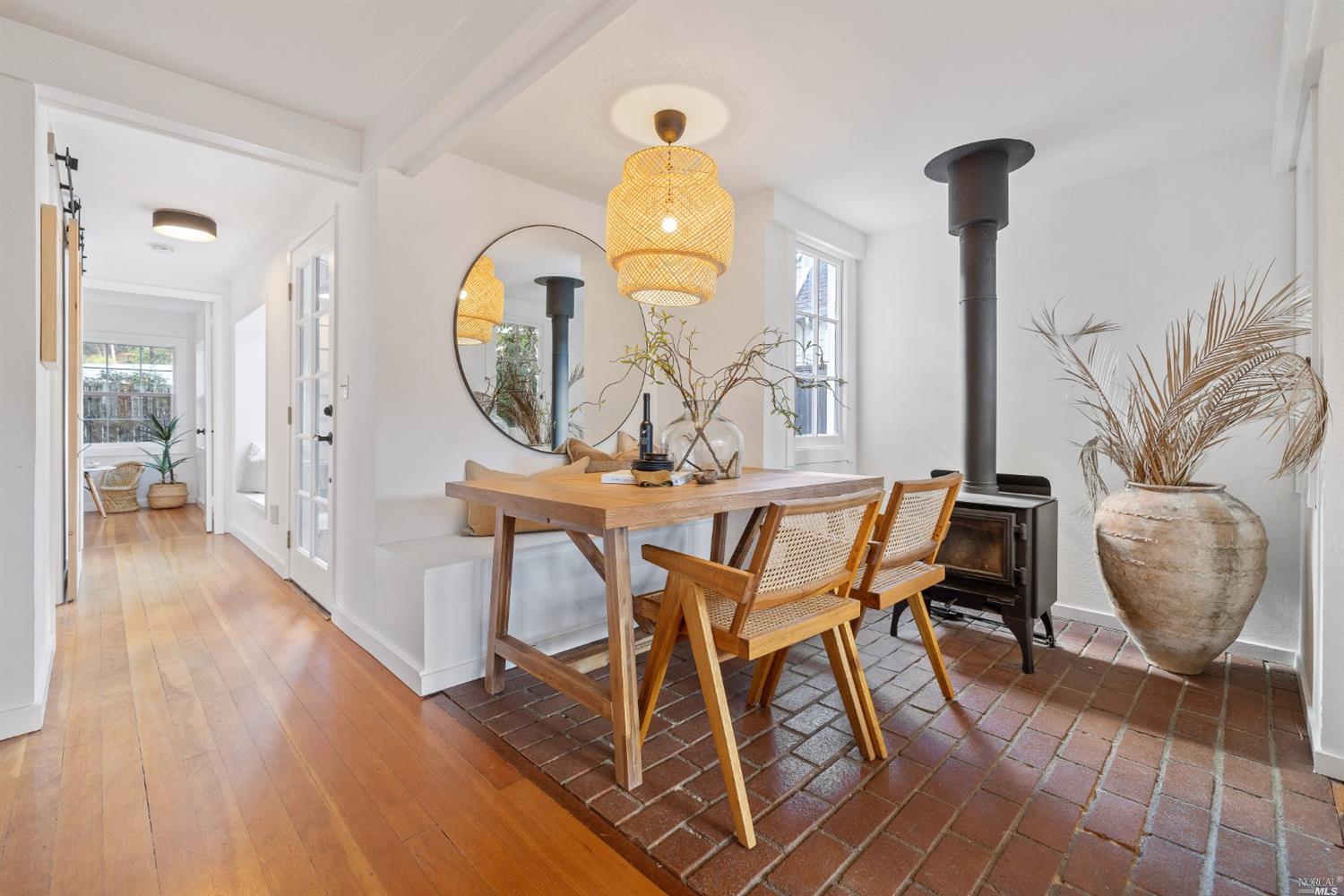 27 Laurel Avenue San Anselmo, CA 94960 - Photo 9 of 52 a dining room with furniture and wooden floor