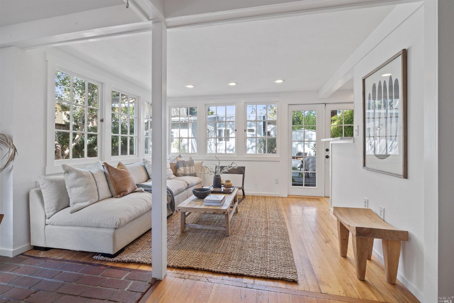 27 Laurel Avenue San Anselmo, CA 94960 - Photo 10 of 52 a living room with furniture and a large window
