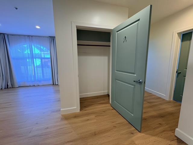 89 Goethe Street, Unit 3 Daly City, CA 94014 - Photo 5 of 10 an empty room with wooden floor