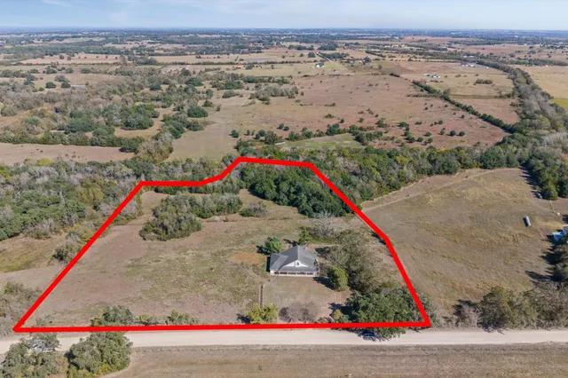 an aerial view of beach and ocean view