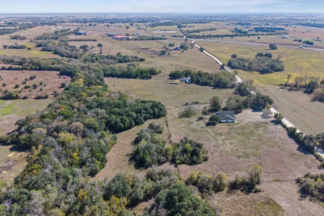 an aerial view of lake residential house with outdoor space