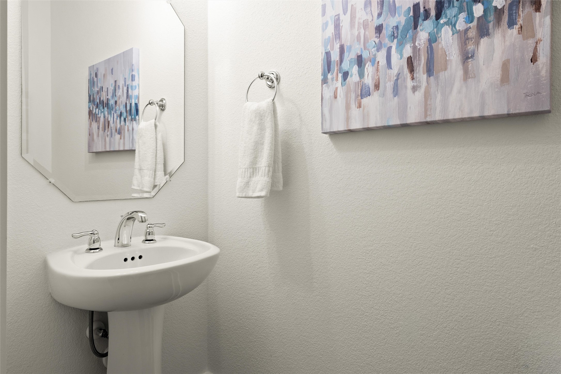 299 Tierra Trail Dripping Springs, TX 78620 - Photo 11 of 40 a bathroom with a sink and mirror