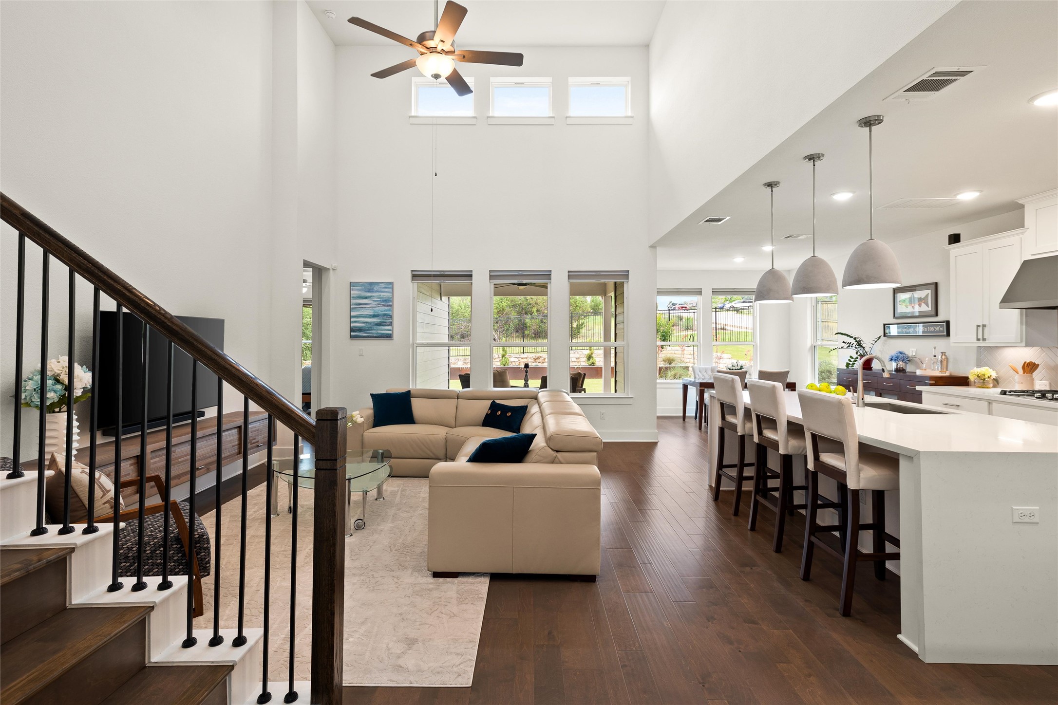 299 Tierra Trail Dripping Springs, TX 78620 - Photo 15 of 40 a living room with lots of furniture and a view of kitchen
