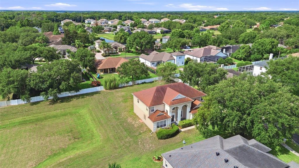 936 Kingsridge Circle Gotha, FL 34734 - Photo 41 of 50 an aerial view of a house with a garden