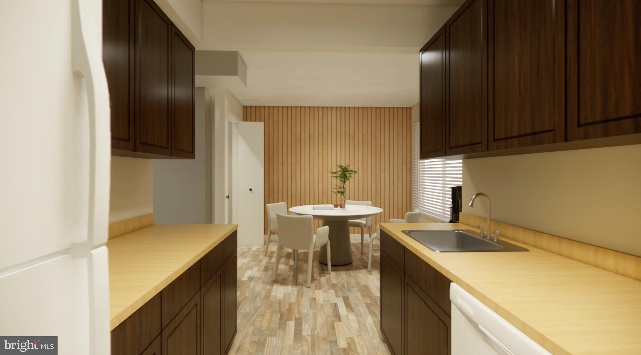 8007 Mandan Road, Unit 203 Greenbelt, MD 20770 - Photo 17 of 25 a kitchen with a sink and refrigerator