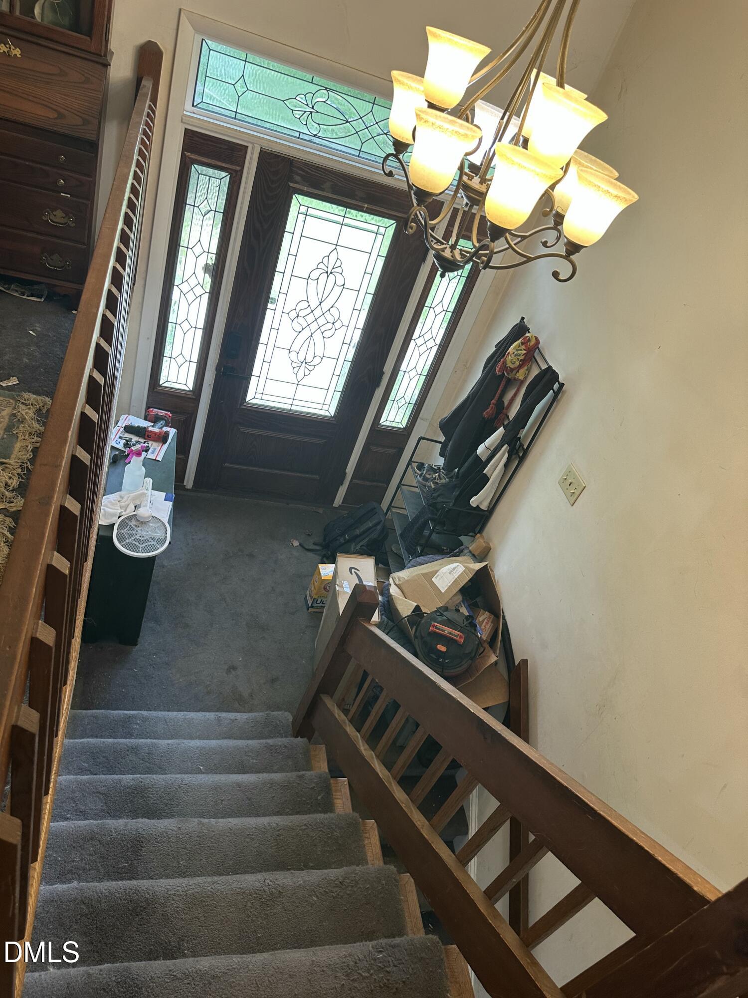 5605 Alpine Drive Raleigh, NC 27609 - Photo 3 of 11 a view of entryway and hall with wooden floor