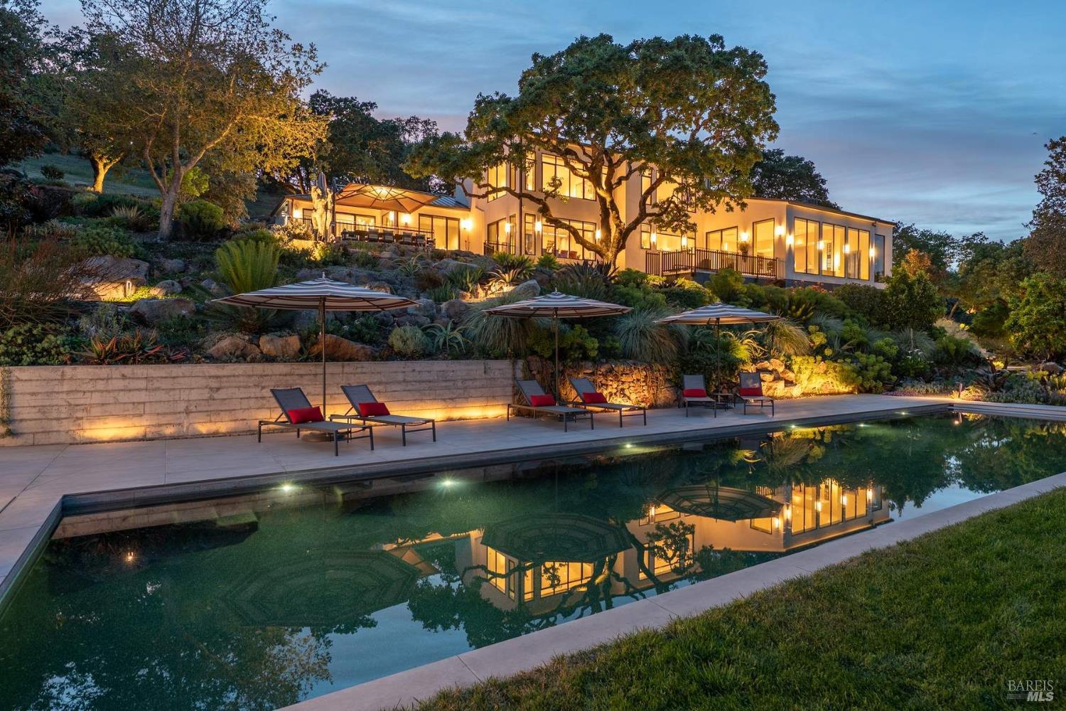 a view of swimming pool from a yard