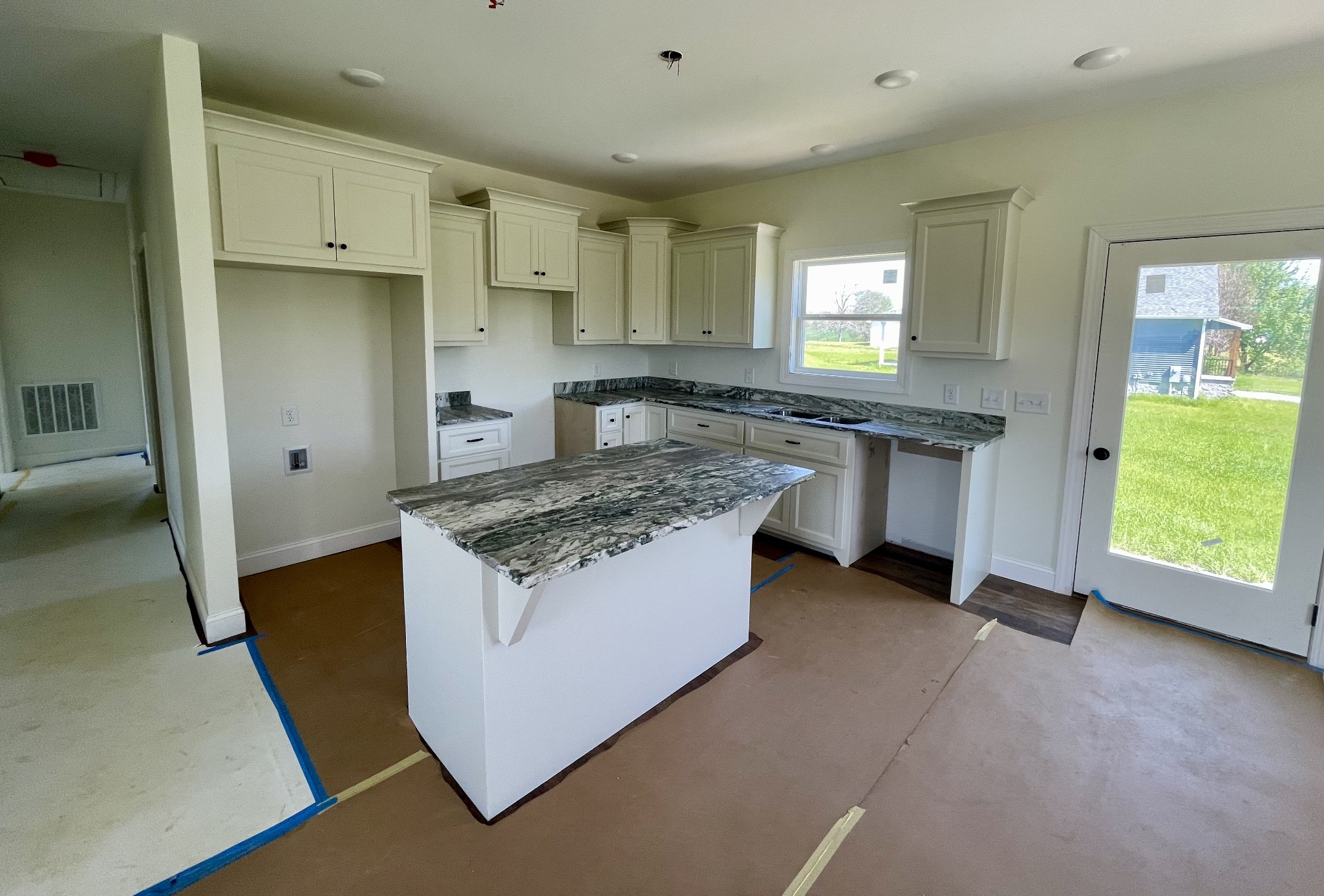 58 Union Hill Road Loretto, TN 38469 - Photo 3 of 13 a kitchen with stainless steel appliances granite countertop a stove and a sink