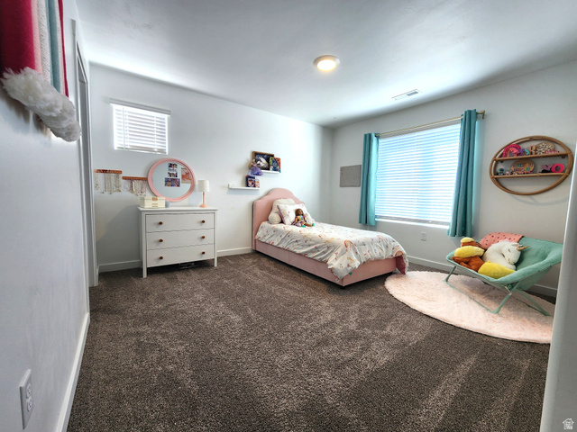 1736 East Fall Street Eagle Mountain, UT 84005 - Photo 16 of 30 Bedroom featuring baseboards and dark colored carpet