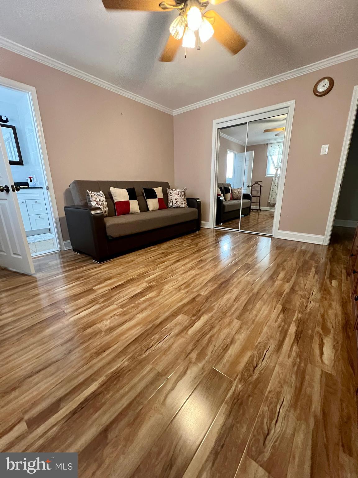 2988 Welsh Road Philadelphia, PA 19152 - Photo 27 of 38 a living room with furniture and a wooden floor