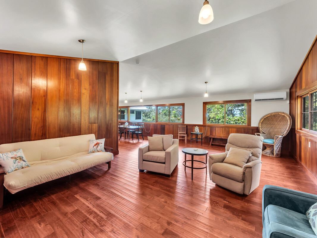 46 Kokea Street Hilo, HI 96720 - Photo 13 of 29 a living room with furniture and a large window