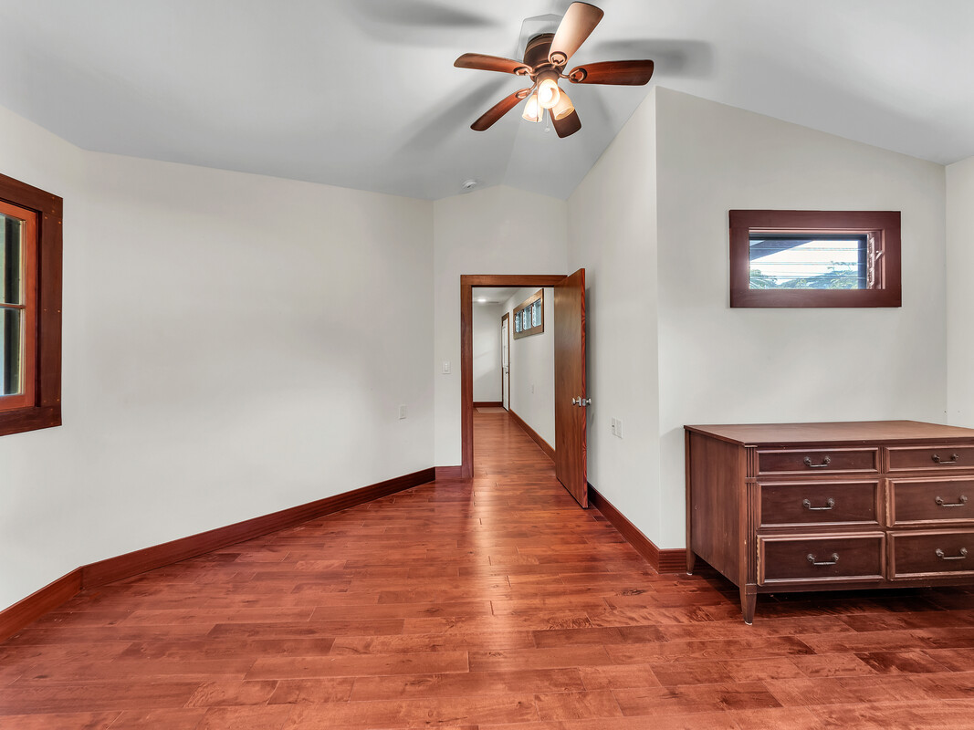 46 Kokea Street Hilo, HI 96720 - Photo 16 of 29 a view of a livingroom with a bookshelf