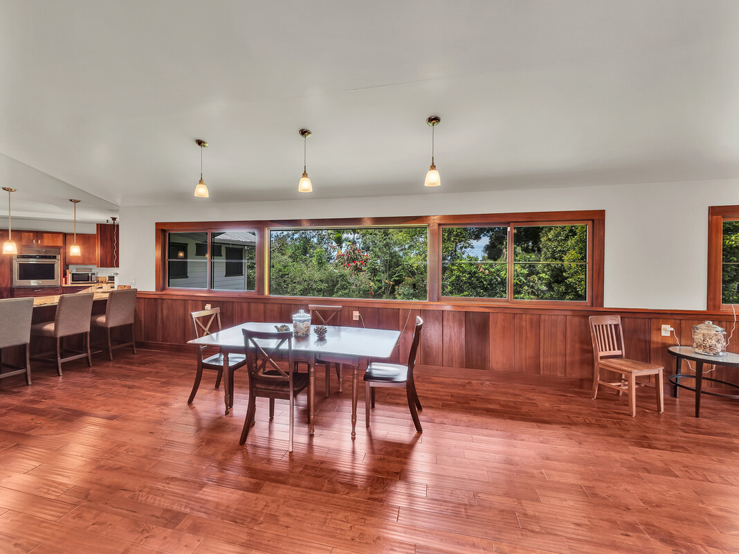 46 Kokea Street Hilo, HI 96720 - Photo 5 of 29 a view of a dining room with furniture window and wooden floor