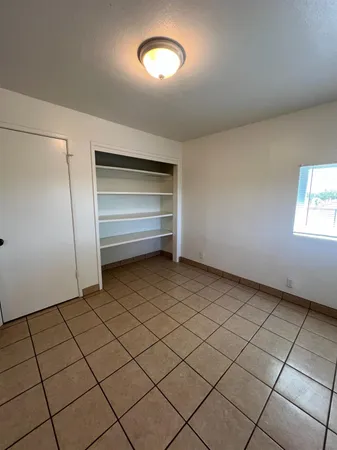 a view of a room and window