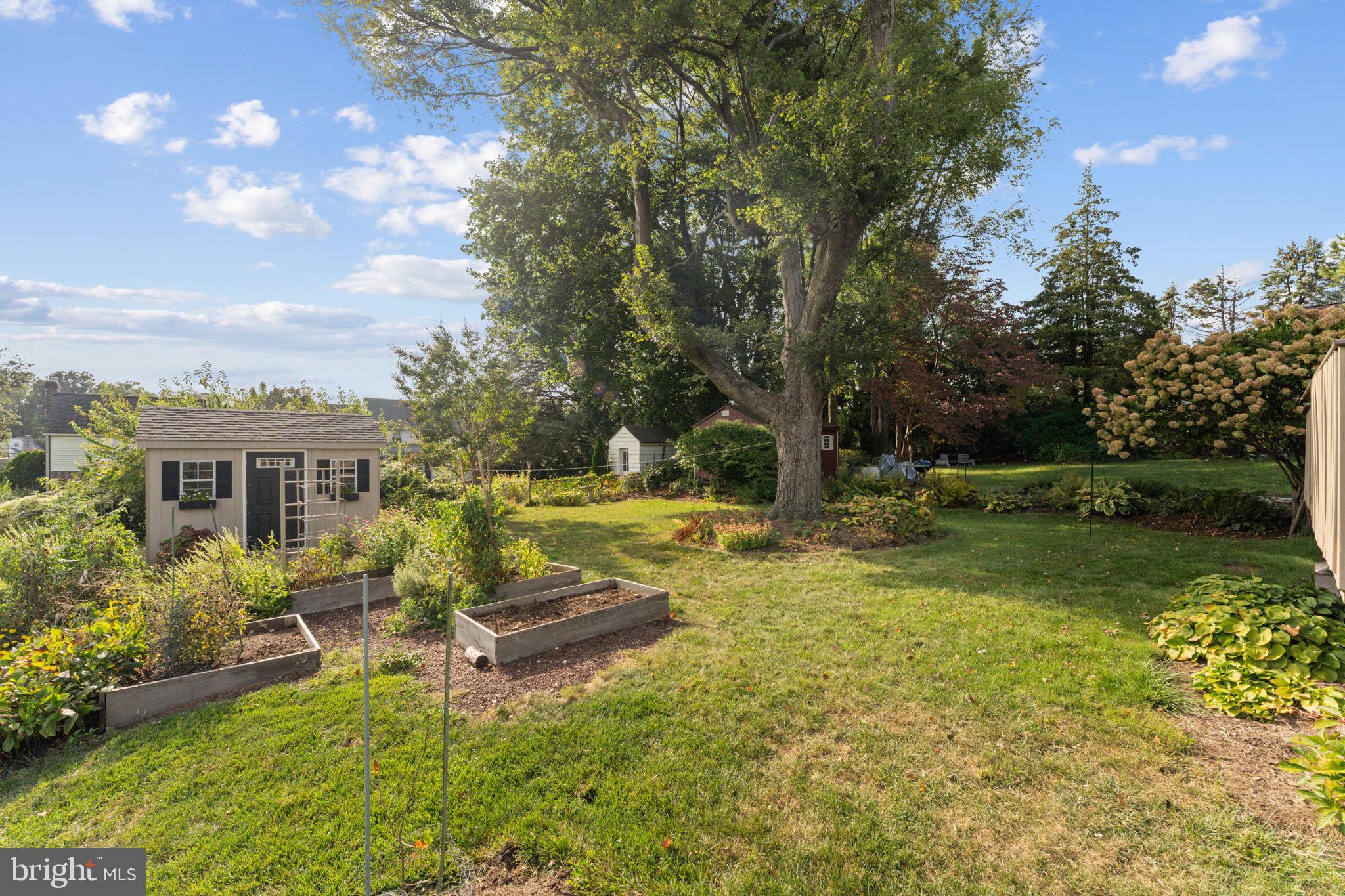 18 Manor Road Paoli, PA 19301 - Photo 34 of 41 Lovely yard, mature gardens, and garden shed.