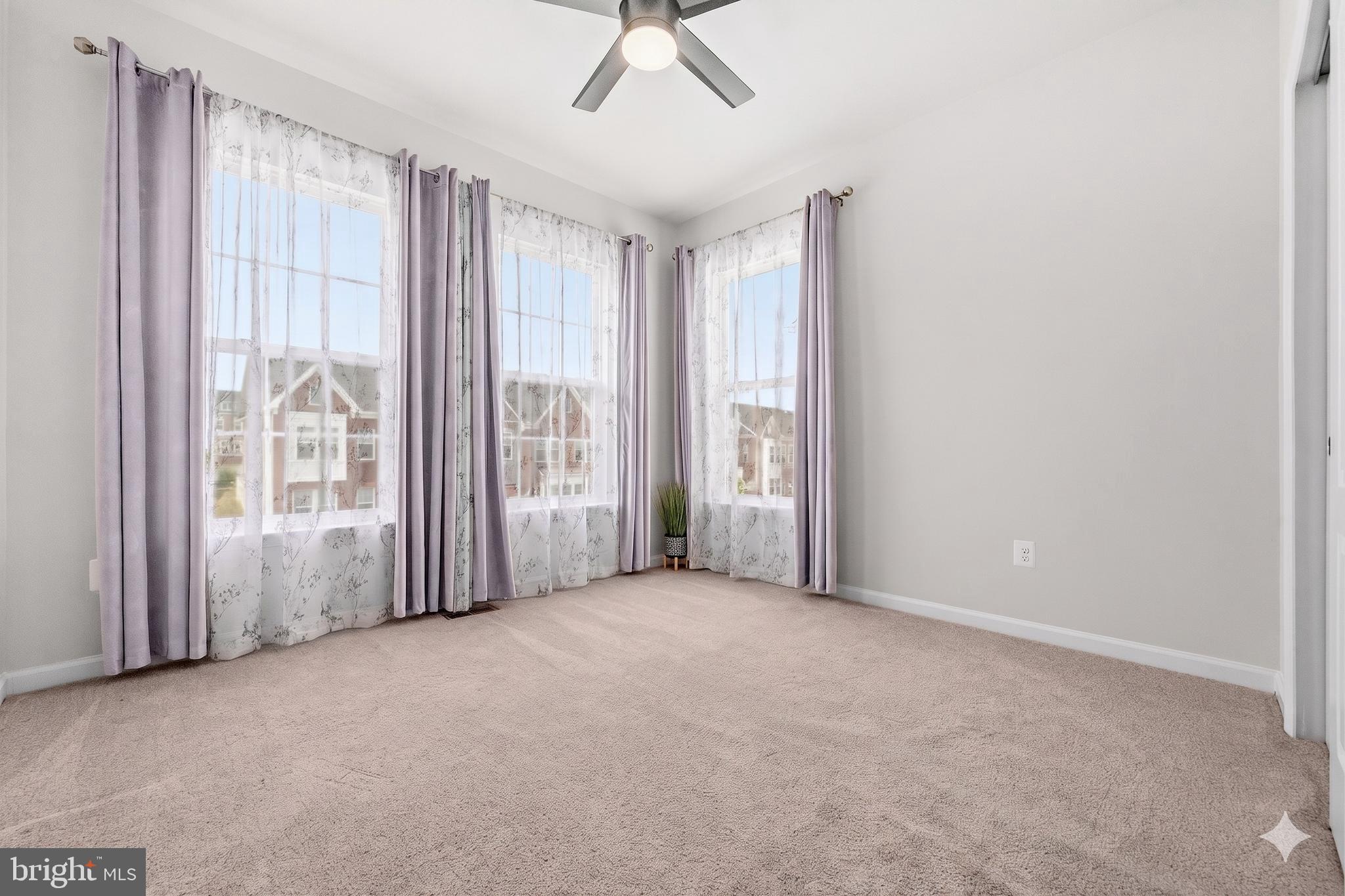 7715 Cresap Lane Hanover, MD 21076 - Photo 25 of 42 a view of a livingroom with a staircase