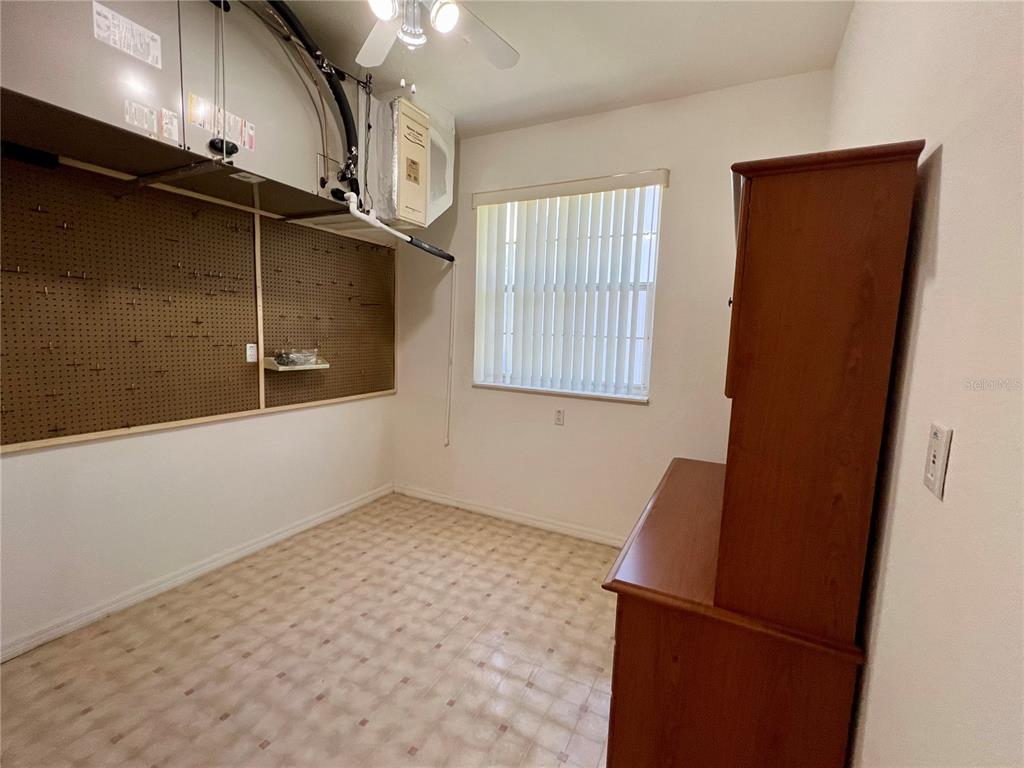 11159 Southwest 71st Terrace Road Ocala, FL 34476 - Photo 11 of 25 a view of empty room with windows