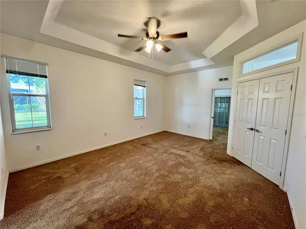 11159 Southwest 71st Terrace Road Ocala, FL 34476 - Photo 13 of 25 a view of a livingroom with a ceiling fan and window