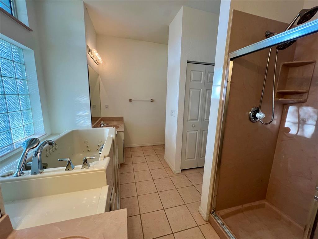 11159 Southwest 71st Terrace Road Ocala, FL 34476 - Photo 20 of 25 a bathroom with a bathtub and shower