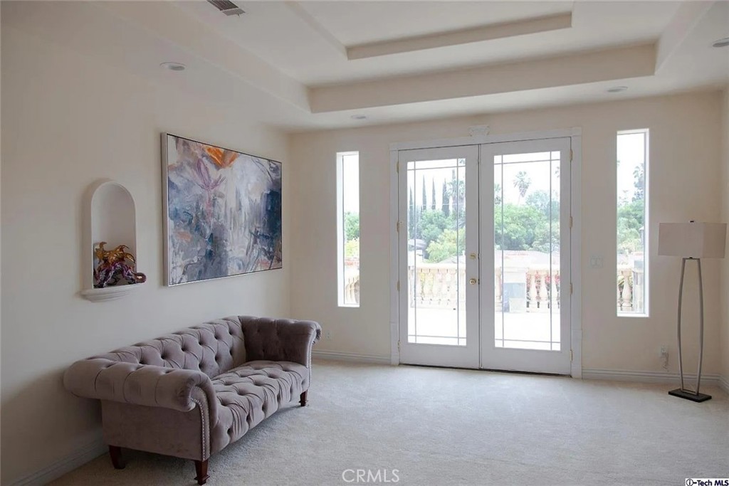 10062 Valley Cir Boulevard Chatsworth, CA 91311 - Photo 21 of 35 a living room with furniture and a large window