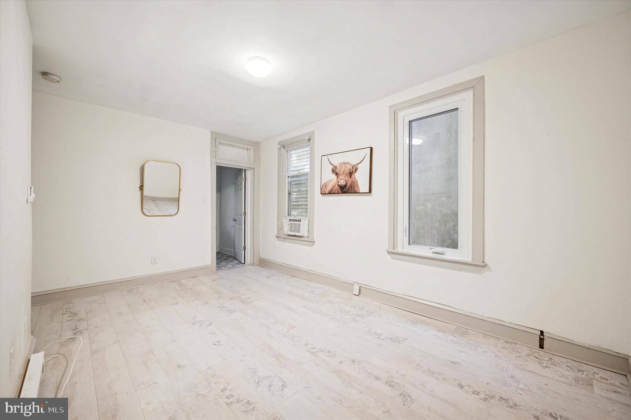 an empty room with windows