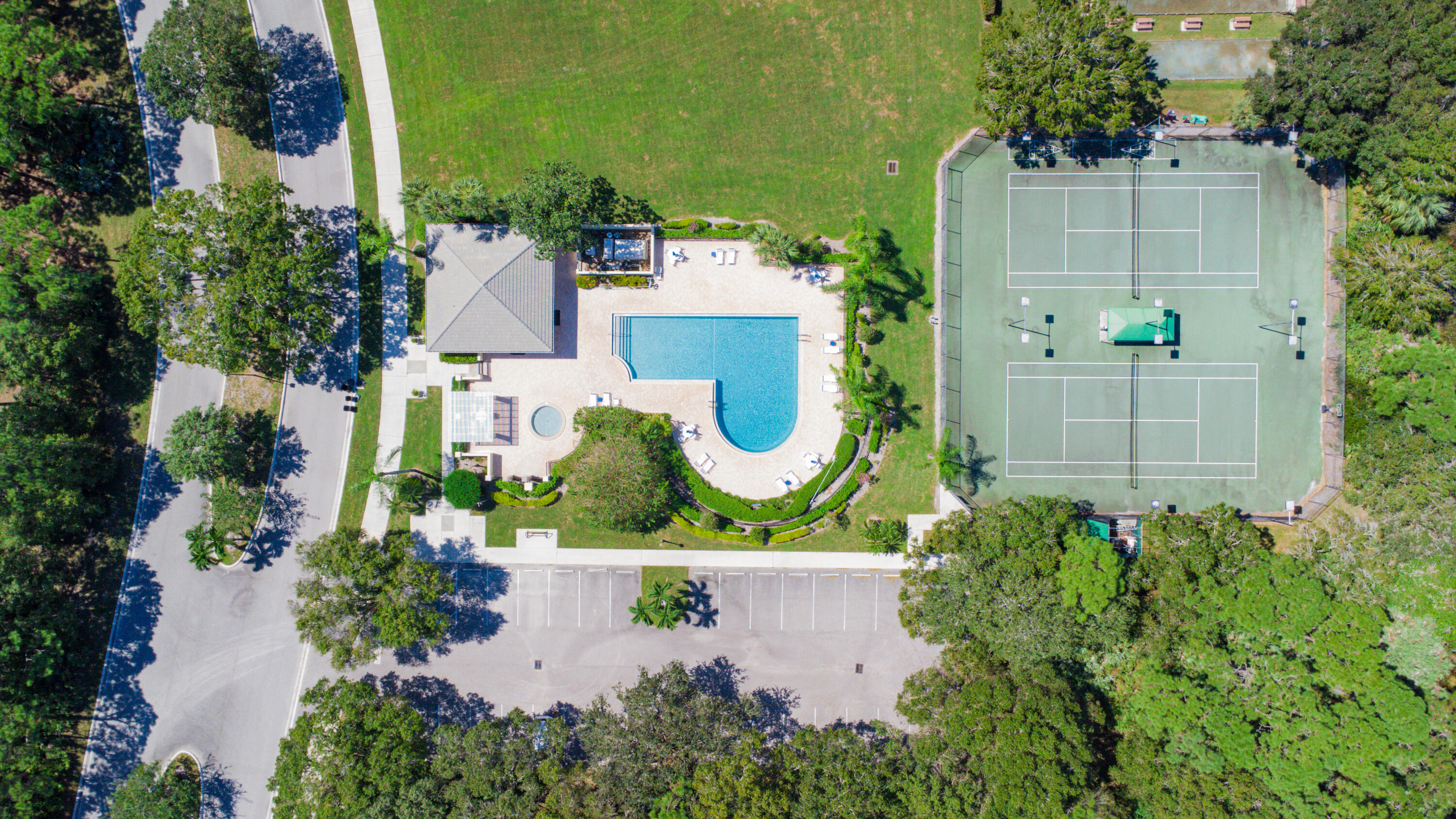 5058 Southeast Inkwood Way Hobe Sound, FL 33455 - Photo 36 of 36 an aerial view of a house with a garden
