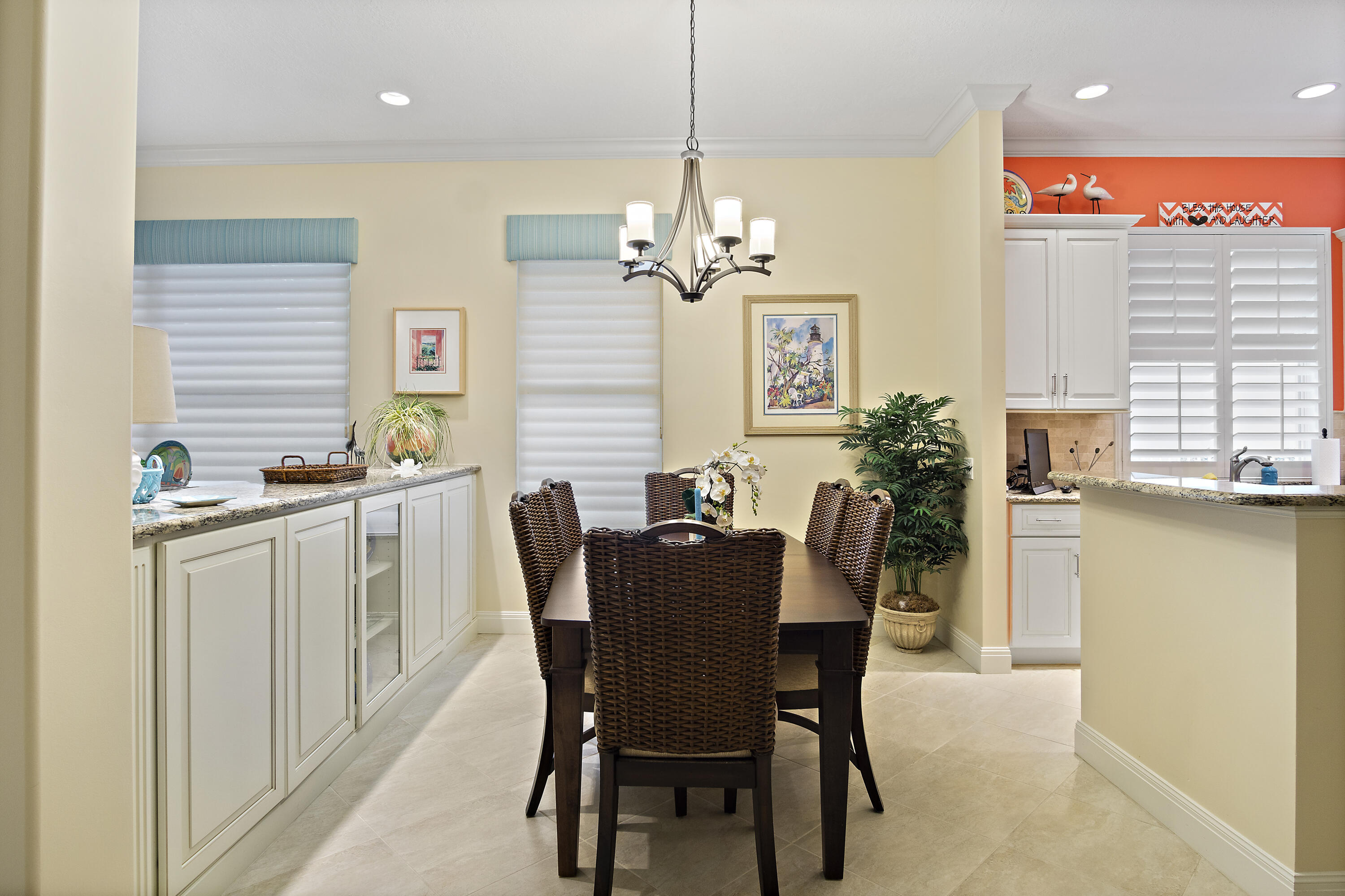 5058 Southeast Inkwood Way Hobe Sound, FL 33455 - Photo 10 of 36 a view of a dining room with furniture window and outside view
