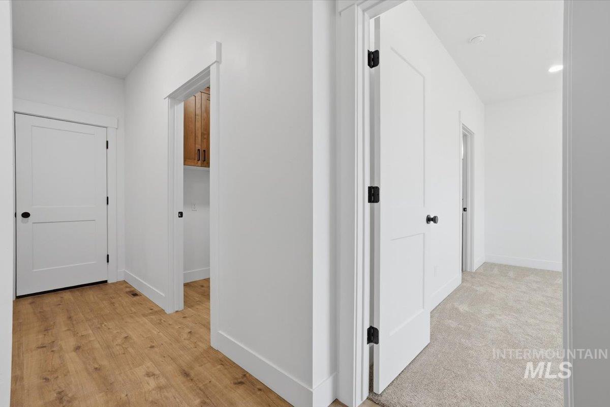 2173 Austin Way Fruitland, ID 83619 - Photo 15 of 28 Corridor featuring baseboards and recessed lighting