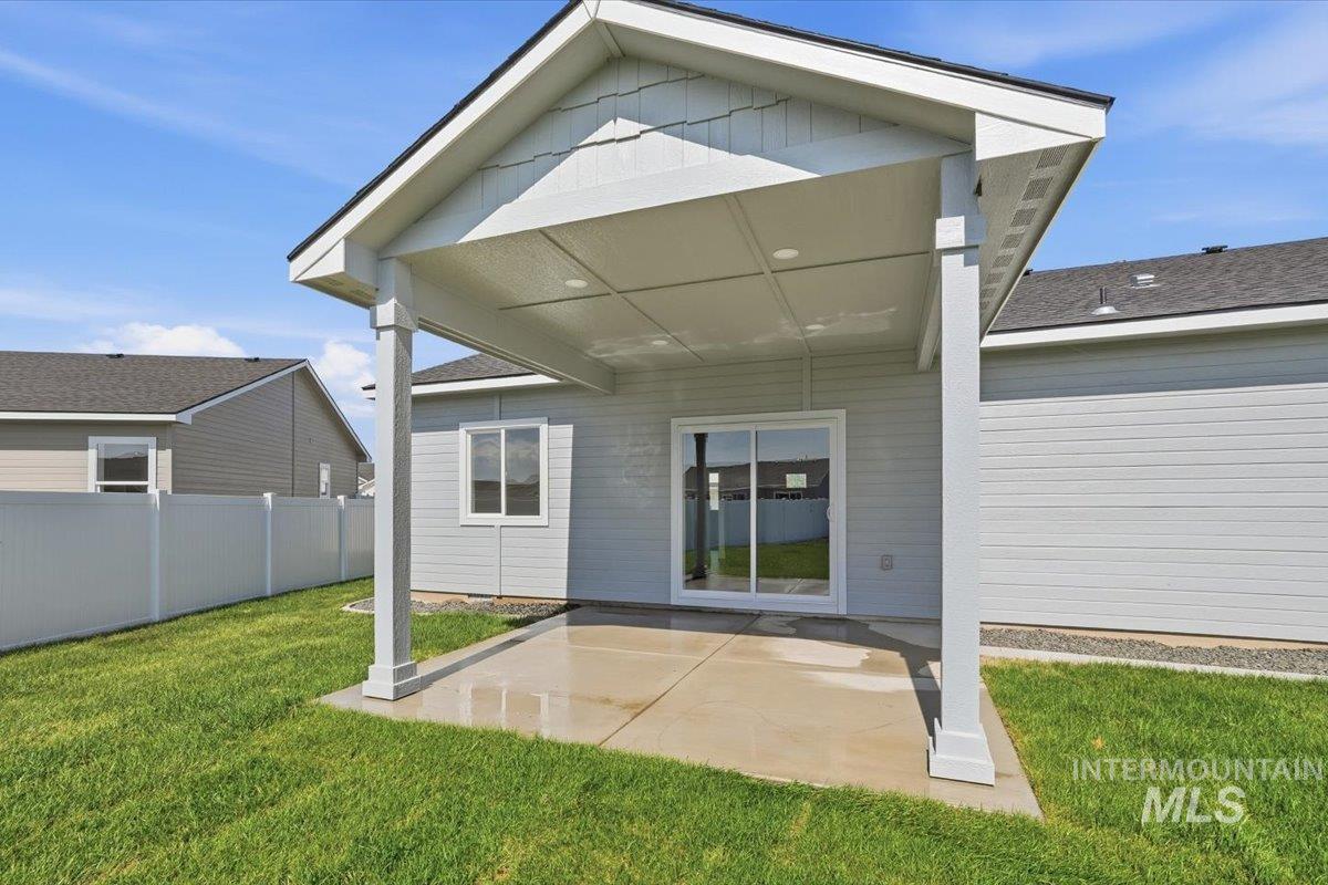 2173 Austin Way Fruitland, ID 83619 - Photo 21 of 28 Back of property with a patio