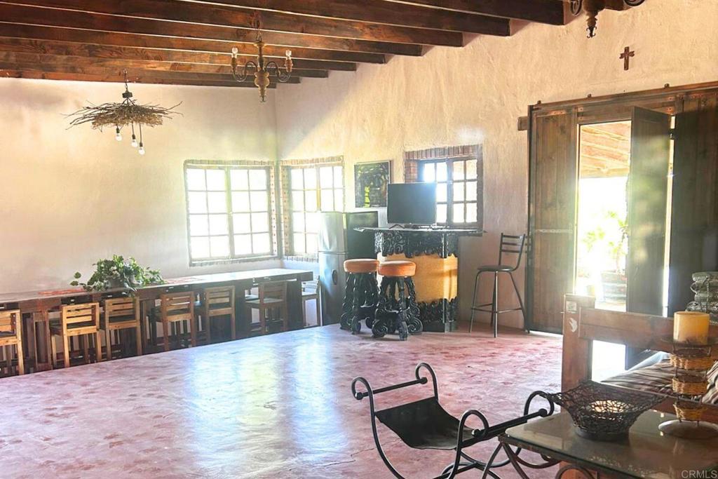 53 Tierra Santa Durham, OS 27707 - Photo 13 of 15 a dining room with furniture window and wooden floor