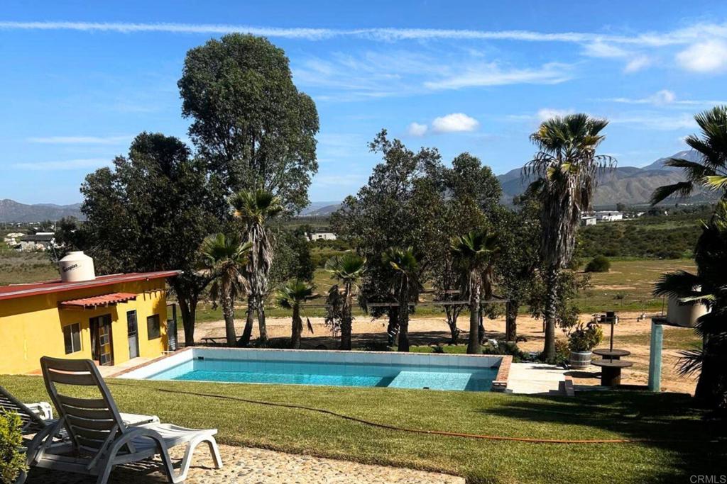 53 Tierra Santa Durham, OS 27707 - Photo 5 of 15 a view of a house with a big yard