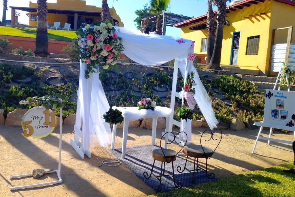 53 Tierra Santa Durham, OS 27707 - Photo 8 of 15 a view of a chairs and table in backyard