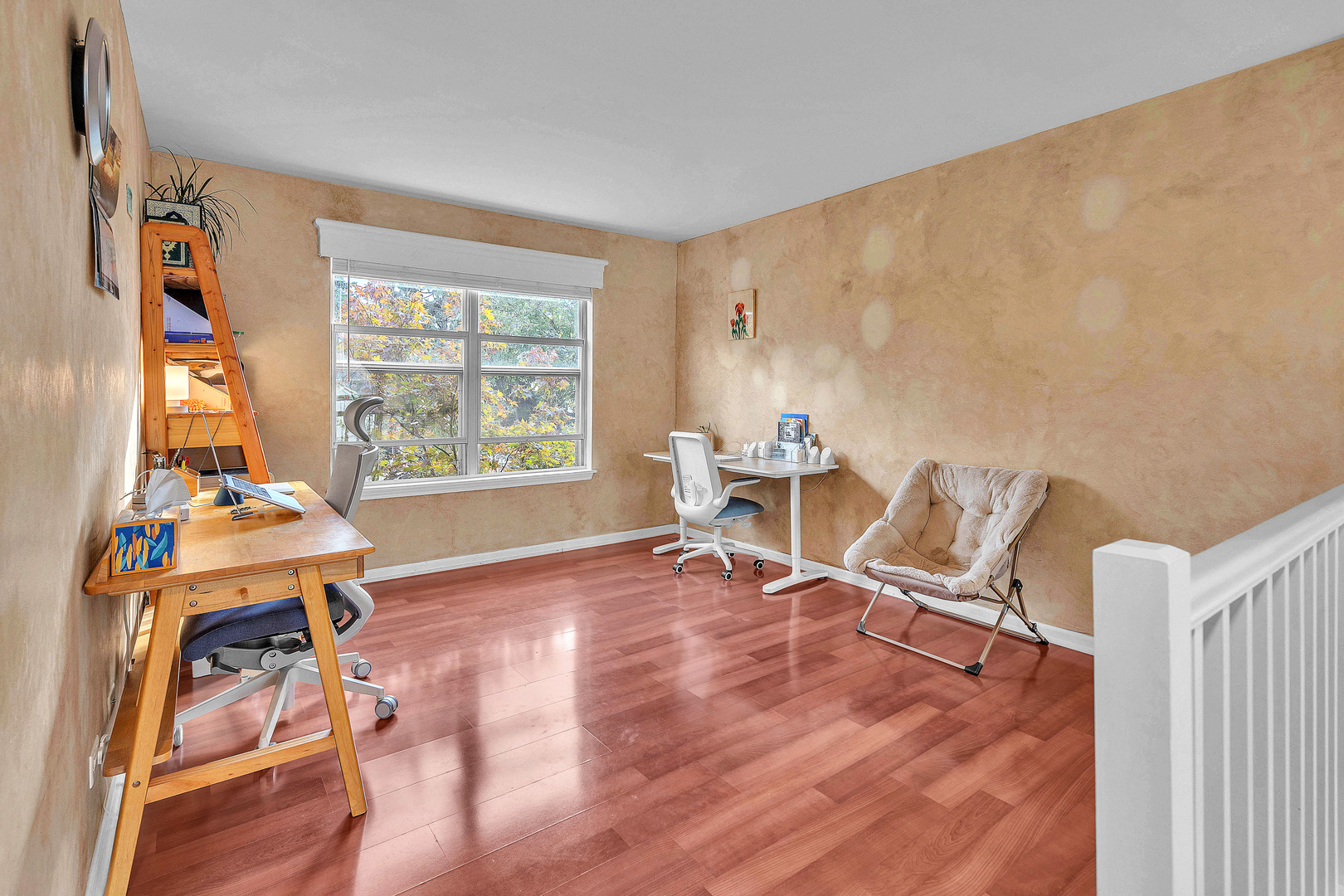 681 Legends Drive Carol Stream, IL 60188 - Photo 11 of 34 a living room with furniture and a wooden floor