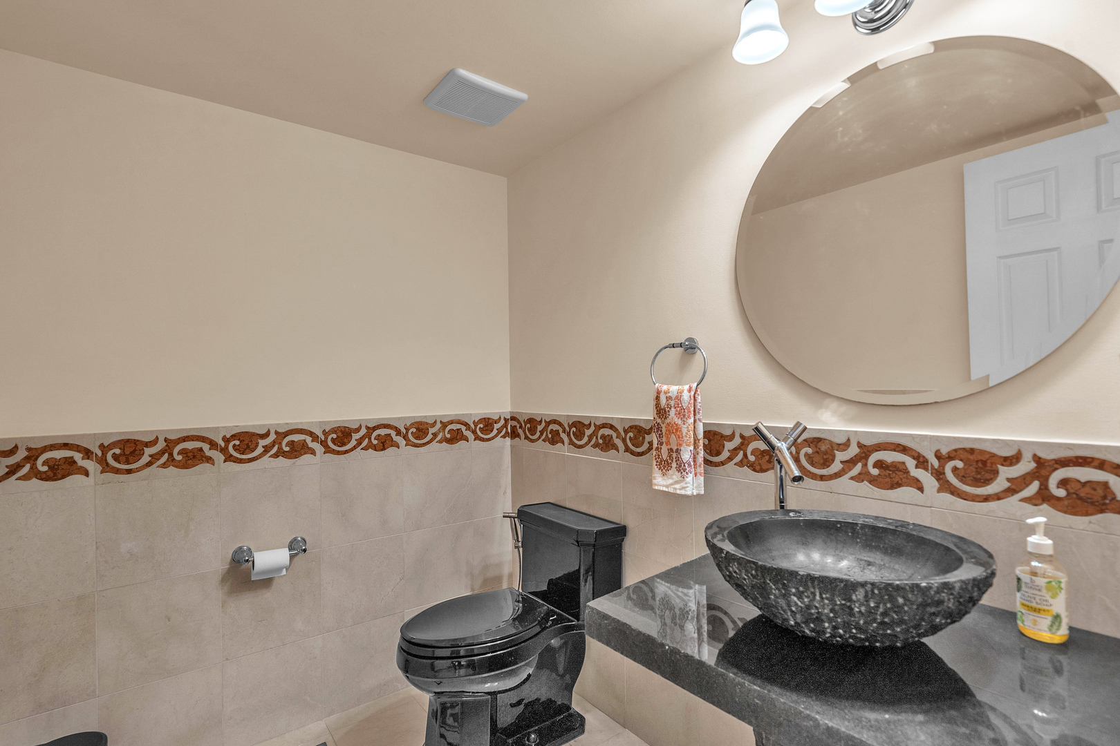 681 Legends Drive Carol Stream, IL 60188 - Photo 23 of 34 a bathroom with a toilet and a mirror