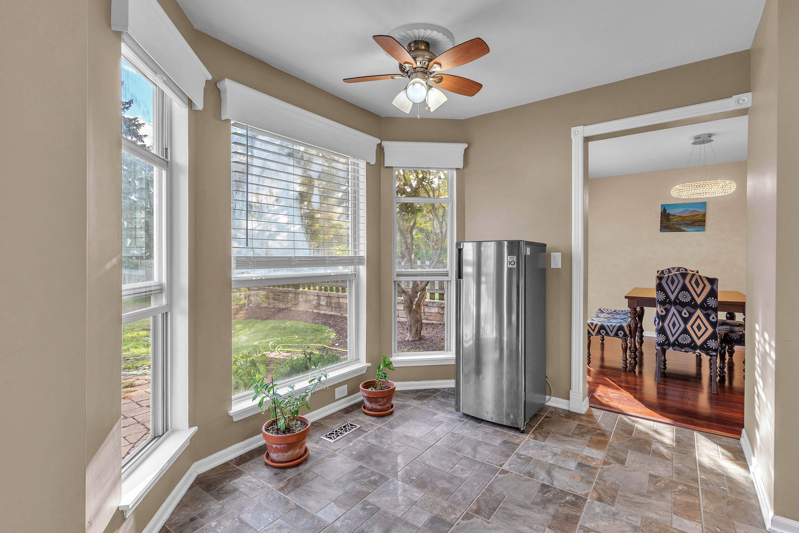 681 Legends Drive Carol Stream, IL 60188 - Photo 24 of 34 a view of a room with gym equipment and a large window