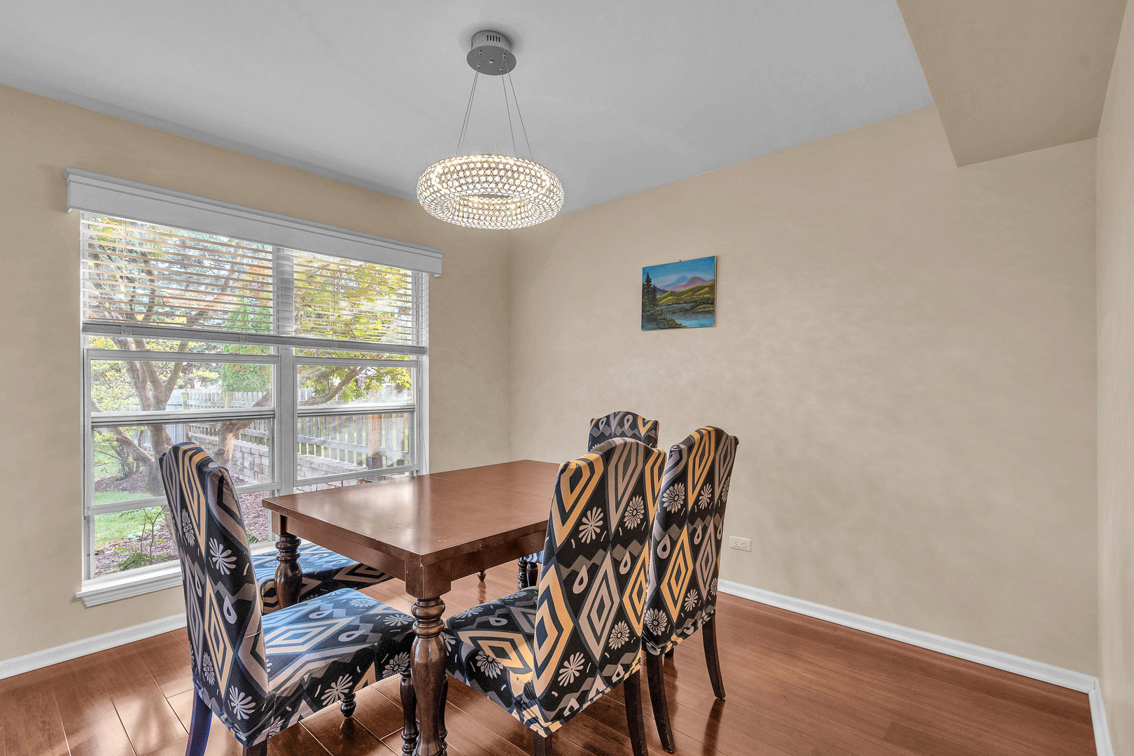 681 Legends Drive Carol Stream, IL 60188 - Photo 28 of 34 a view of a dining room with furniture wooden floor and a window