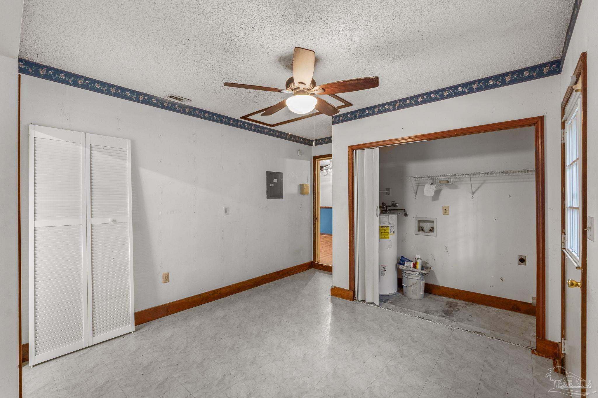 426 Brown Place Crestview, FL 32539 - Photo 19 of 40 a view of empty room with ceiling fan