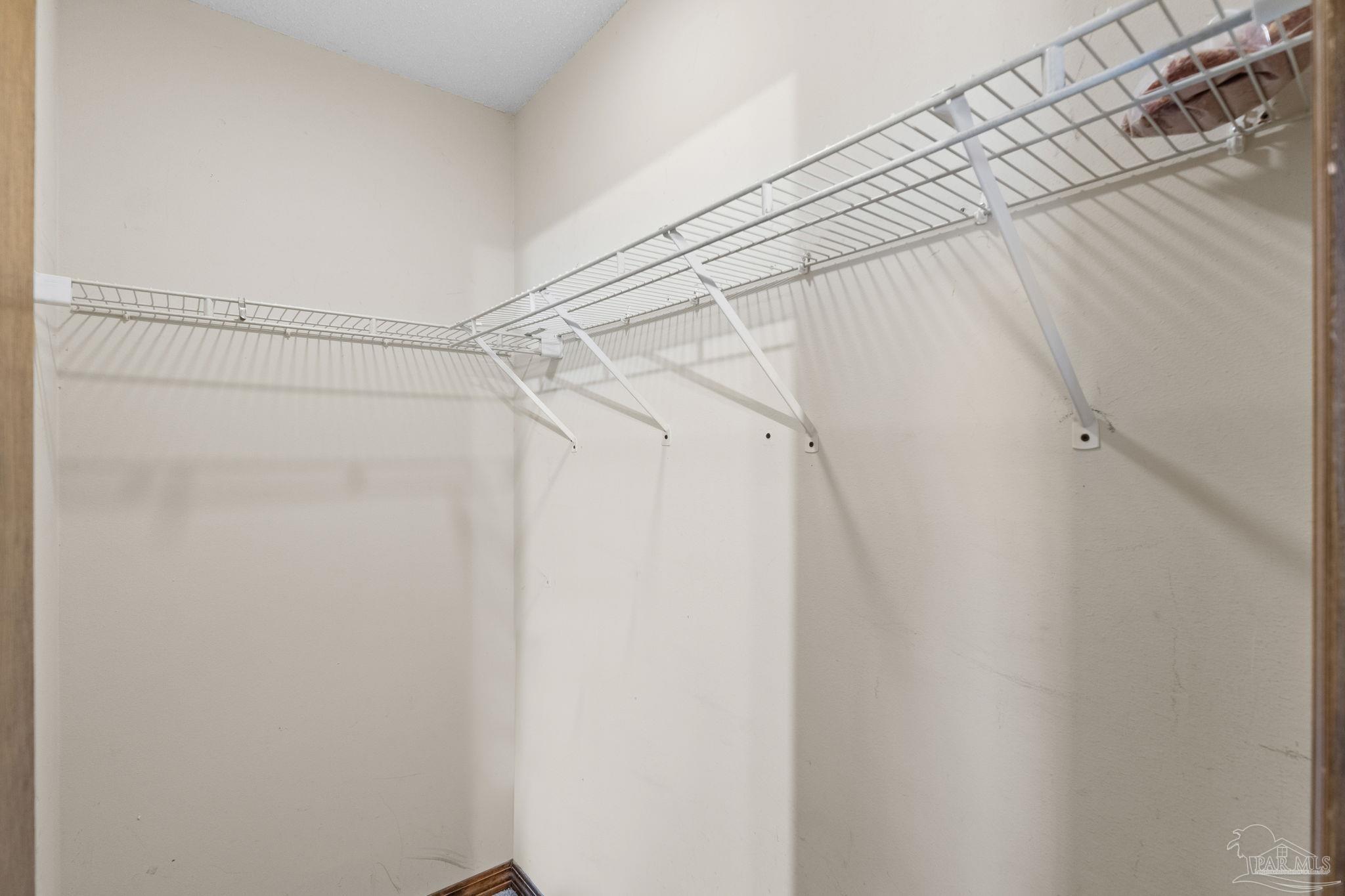 426 Brown Place Crestview, FL 32539 - Photo 24 of 40 a view of a room with racks on the wall