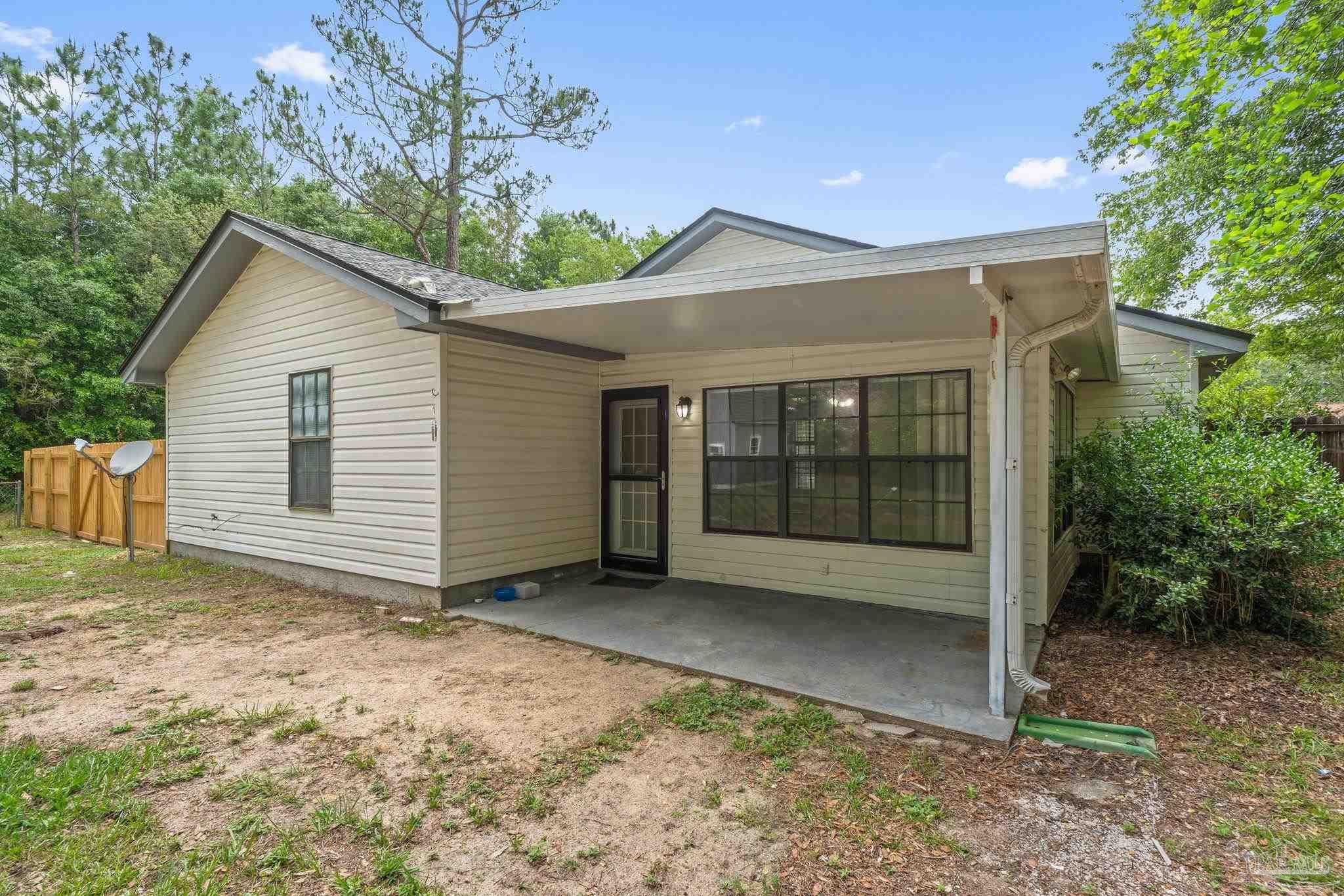 426 Brown Place Crestview, FL 32539 - Photo 36 of 40 a view of a house with a yard